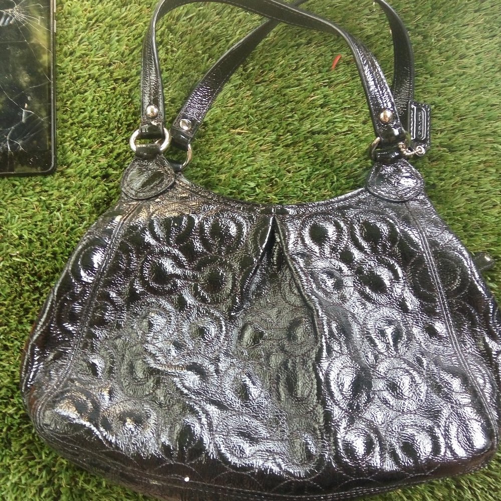 Black monagrammed coach   see